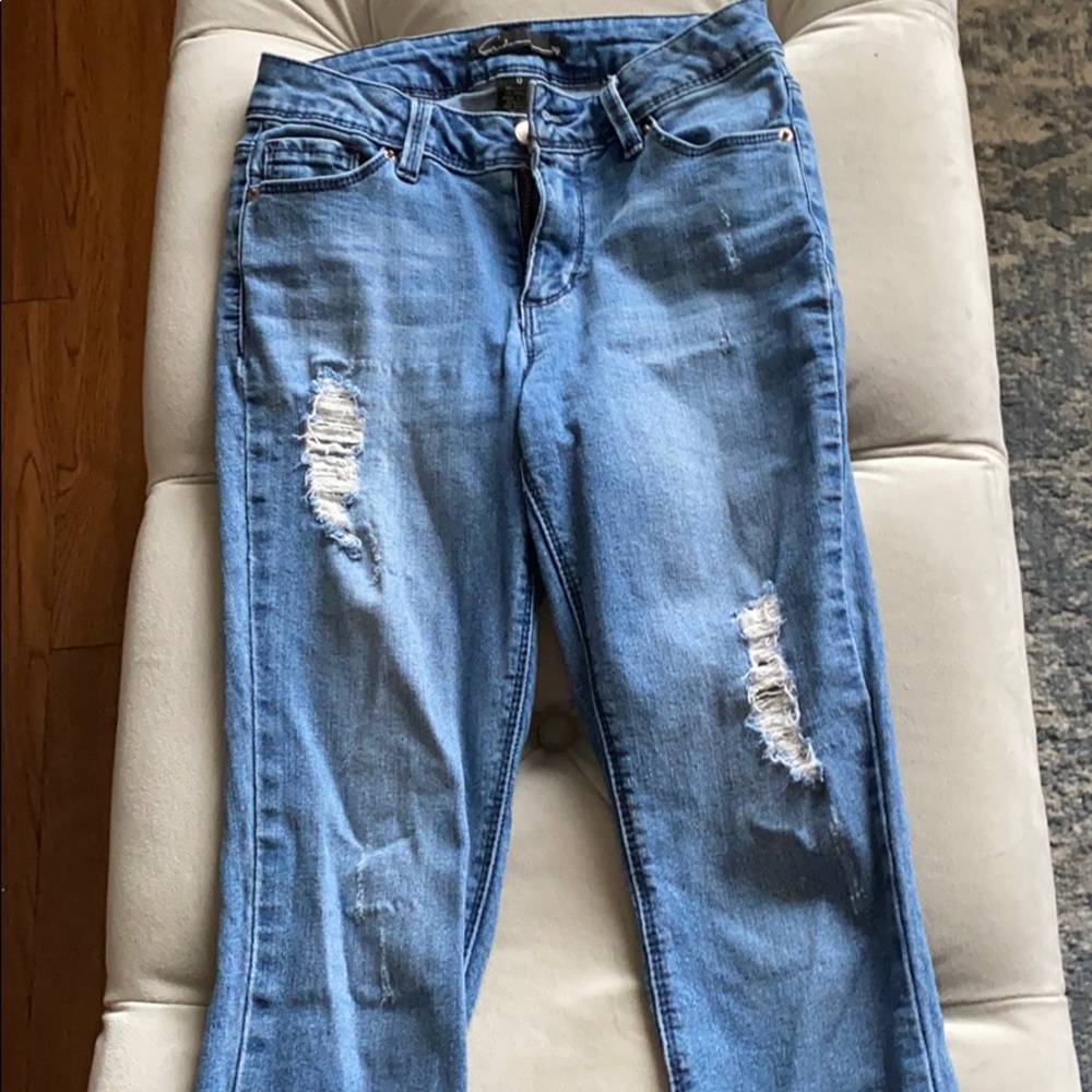 Ripped blue jeans